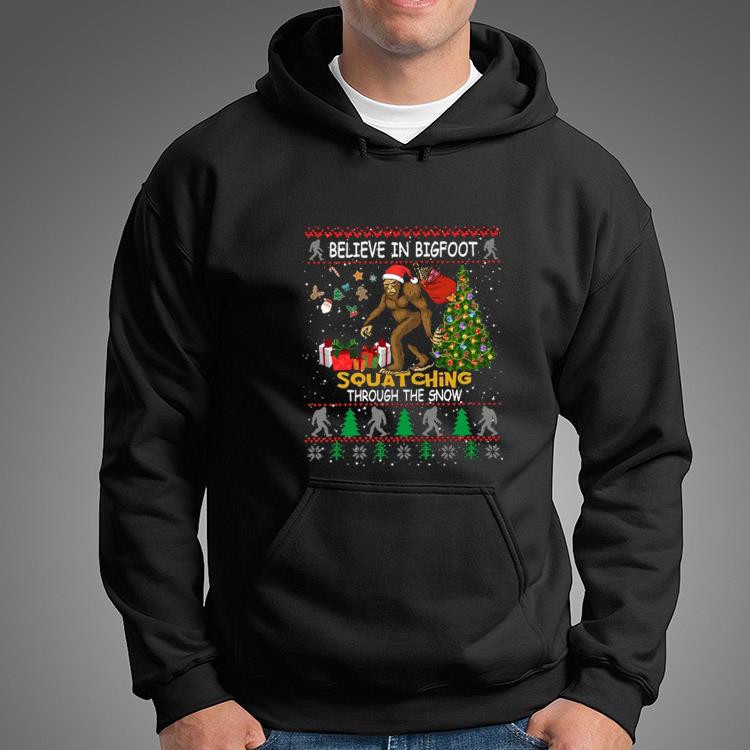 https://images.limotees.net/2021/11/believe-in-bigfoot-squatching-through-the-snow-ugly-christmas-2021-t-shirt-hoodie.jpg